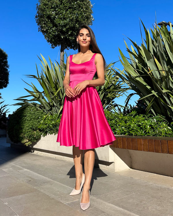 Elegant pink dress with beautiful neckline without sleeves