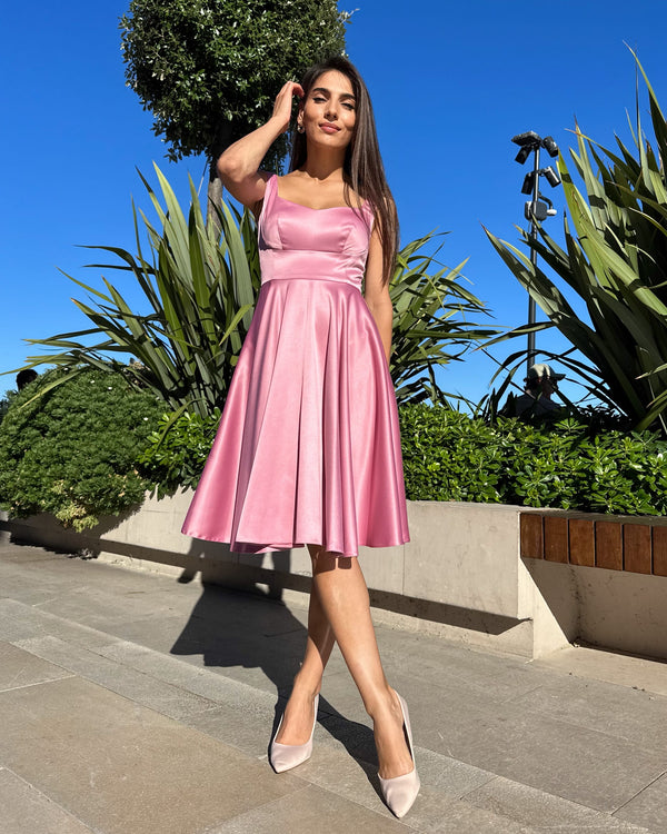 Elegant pink occasion dress with neckline