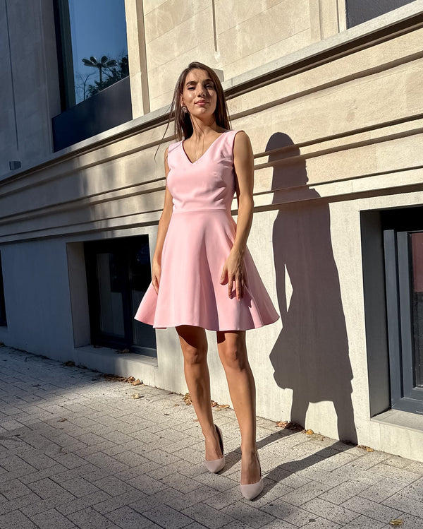 Short pink dress with V-neckline