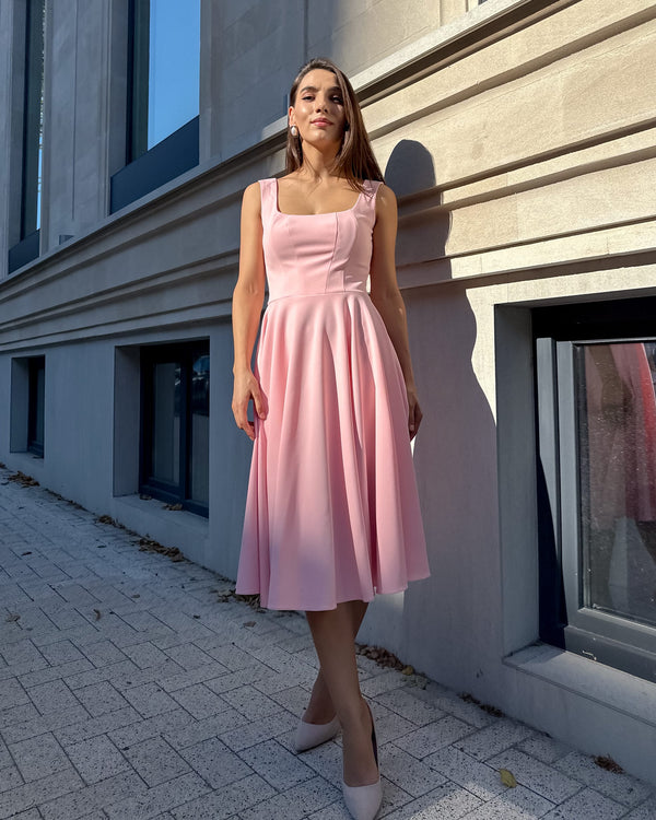 Elegant pink midi dress with neckline