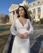 White midi dress with long sleeves, V-neckline