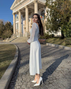 White midi dress with long sleeves, V-neckline